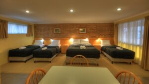 Twin room with three beds at the Jumbuck Motor Inn