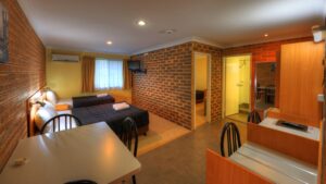 Family room with kitchenette at the Jumbuck Motor Inn