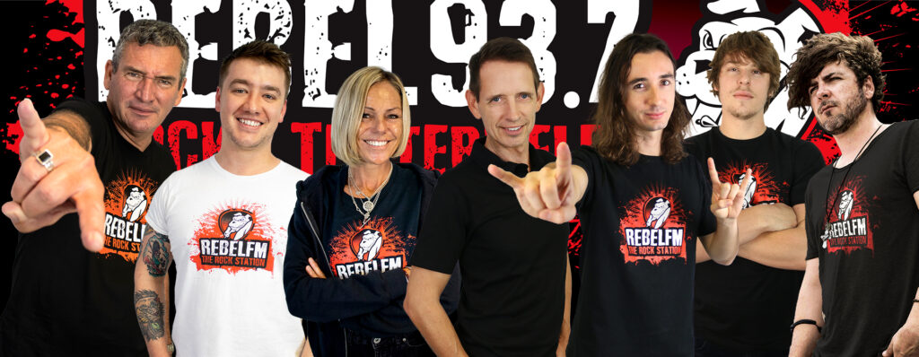 Rebel 93.7 FM presenters posing in station t-shirts