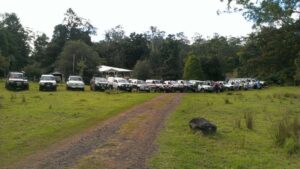 Convoy of four-wheel drives parked in the camping paddock at Levuka