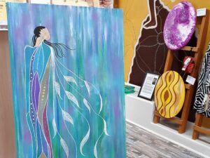 Flowing painting of a woman in blues and greens at Gallery 299