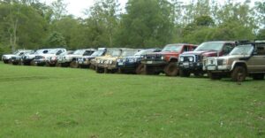 Long line-up of four-wheel drives at Levuka Rainforest Recreation Park