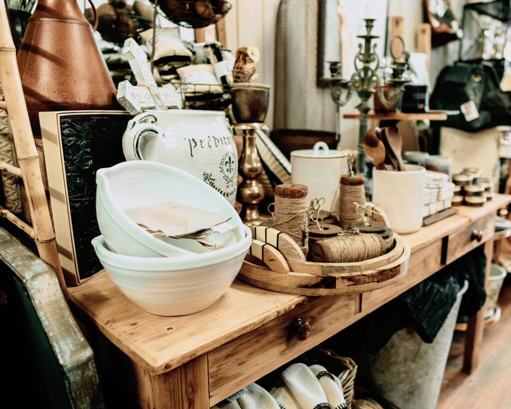 Timber table of bowls, jugs and kitchen homewares at Ruben & Flax