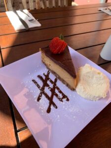 Cheesecake with strawberry and cream at The Courtyard Cafe