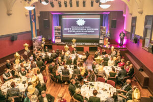 Awards dinner audience seated at round tables in the Tenterfield Cinema and Theatre hall