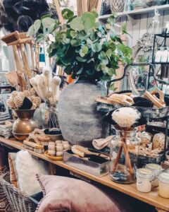Display of dried arrangements, candles and vases at Ruben & Flax