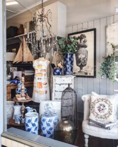 Shop window of ceramics, cushions and lanterns at Ruben & Flax