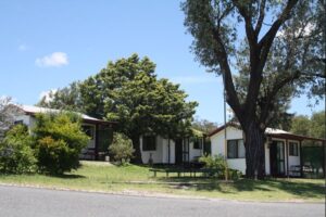 Self-contained cabins along the drive at Glenlyon Dam Tourist Park