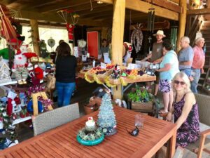 Visitors browsing the Christmas farm shop at Cherrydale Orchard