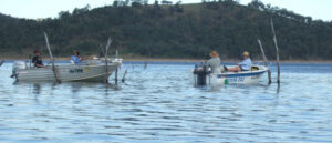 Fishing boats on the water at Glenlyon Dam