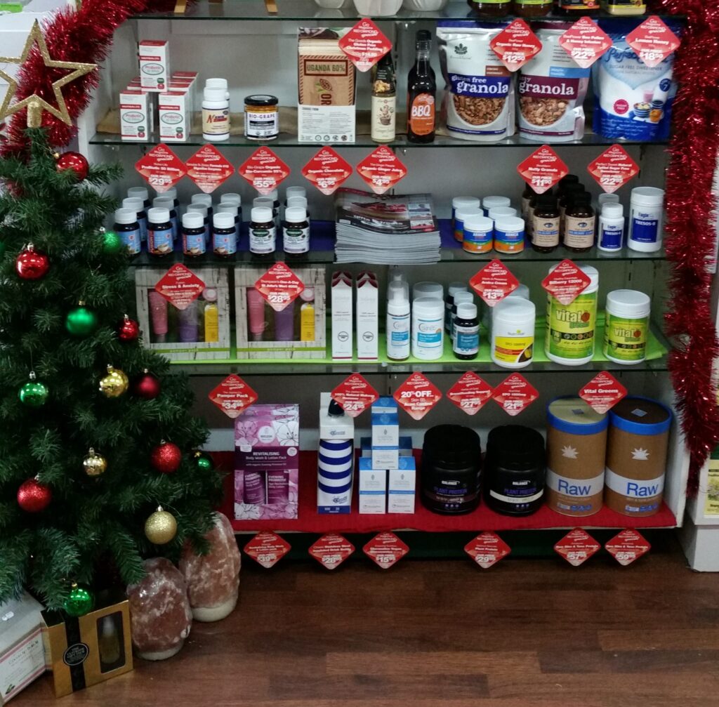 Shelves of health foods and supplements decorated for Christmas at Go Vita Tenterfield