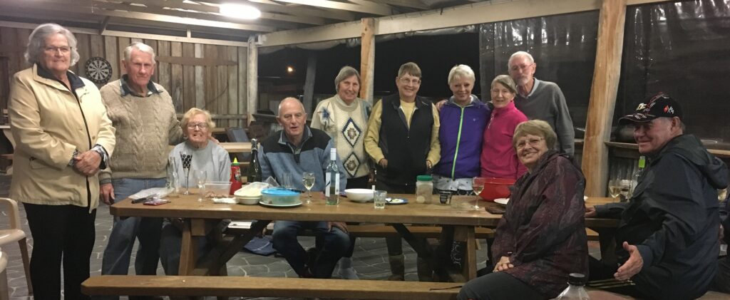 Guests gathered for dinner in the covered barbecue area at the Tenterfield Motor Inn