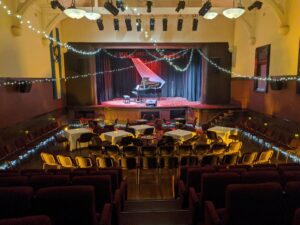 Full house facing the stage at the Tenterfield Cinema and Theatre