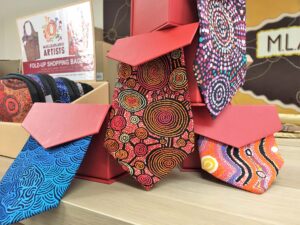 Fold-up shopping baskets in colourful Aboriginal prints at Gallery 299