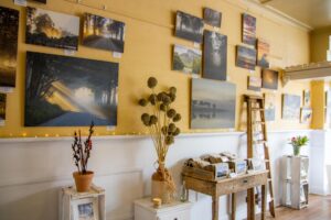 Gallery wall of photographic prints and homewares at My Notes From Gallery and Store