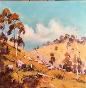 Oil painting of a hillside with gum trees and grazing sheep by Linda Nye