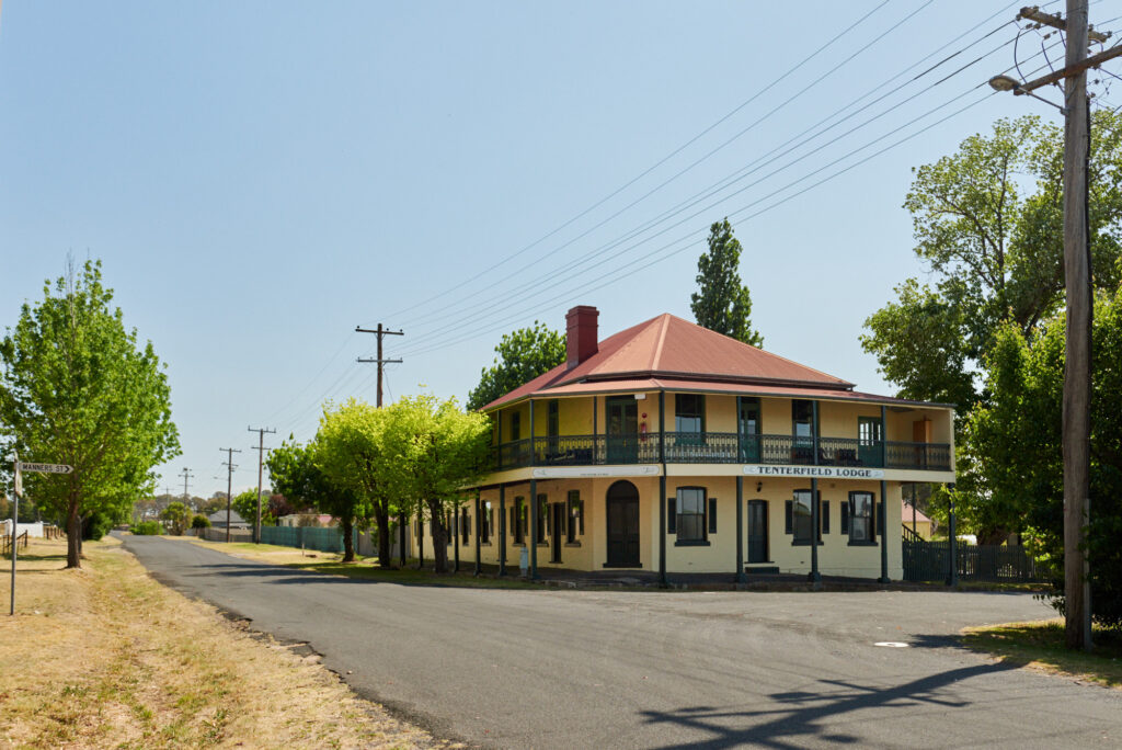 Tenterfield Lodge, a historic red-roofed guesthouse at the caravan park