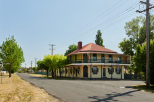 Tenterfield Lodge, a historic red-roofed guesthouse at the caravan park