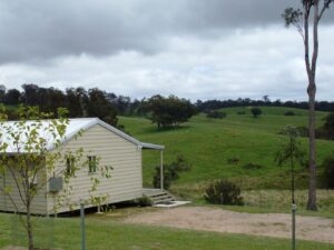 Mistral Hill Country Cottage set on a green hillside near Tenterfield