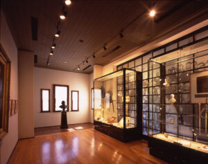 Gallery of display cases and portraits inside the Sir Henry Parkes Memorial School of Arts