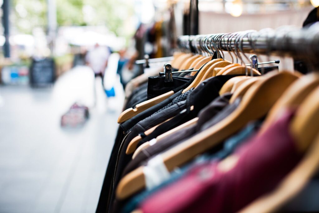Racks of preloved clothing at the Tenterfield Helicopter Op Shop