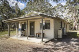 Robinsons Cabin, a self-contained cabin with covered porch in Boonoo Boonoo National Park