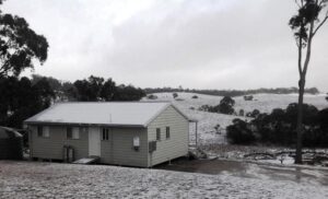 Snow dusting the paddocks around Mistral Hill Country Cottage