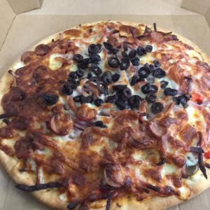 Supreme pizza topped with olives from Tally Ho Tucker