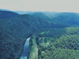 Aerial view of the Clarence River gorge and forested ranges at the wilderness lodge