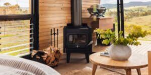 Wood stove and lounge inside the Gabarraa eco cabin