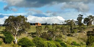 Granite boulders and green countryside surrounding Gabarraa luxury escape