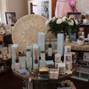 Table of candles, diffusers and gifts at The Corner Life & Style