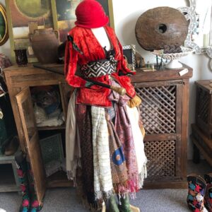Vintage clothing and textiles displayed on a mannequin at Margot Rees Antiques