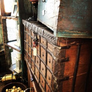 Antique timber chests with ornate metalwork at Margot Rees Antiques