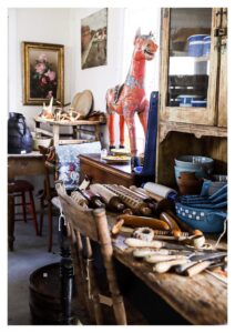 Rustic workbench of old tools and curios at White Cottage Flower Farm