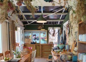 Garden room strung with drying flowers at White Cottage Flower Farm