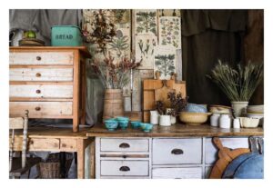 Vintage dressers styled with dried flowers and ceramics at White Cottage Flower Farm