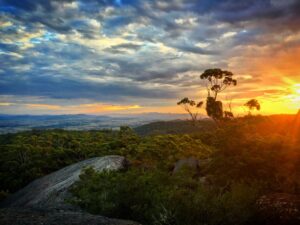 Sunset over the bushland from a granite outcrop in Basket Swamp National Park