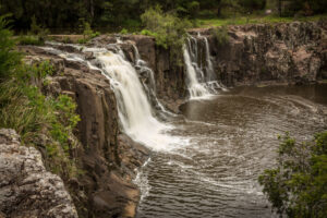 Tooloom Falls cascading over basalt ledges, photo by Peter Reid