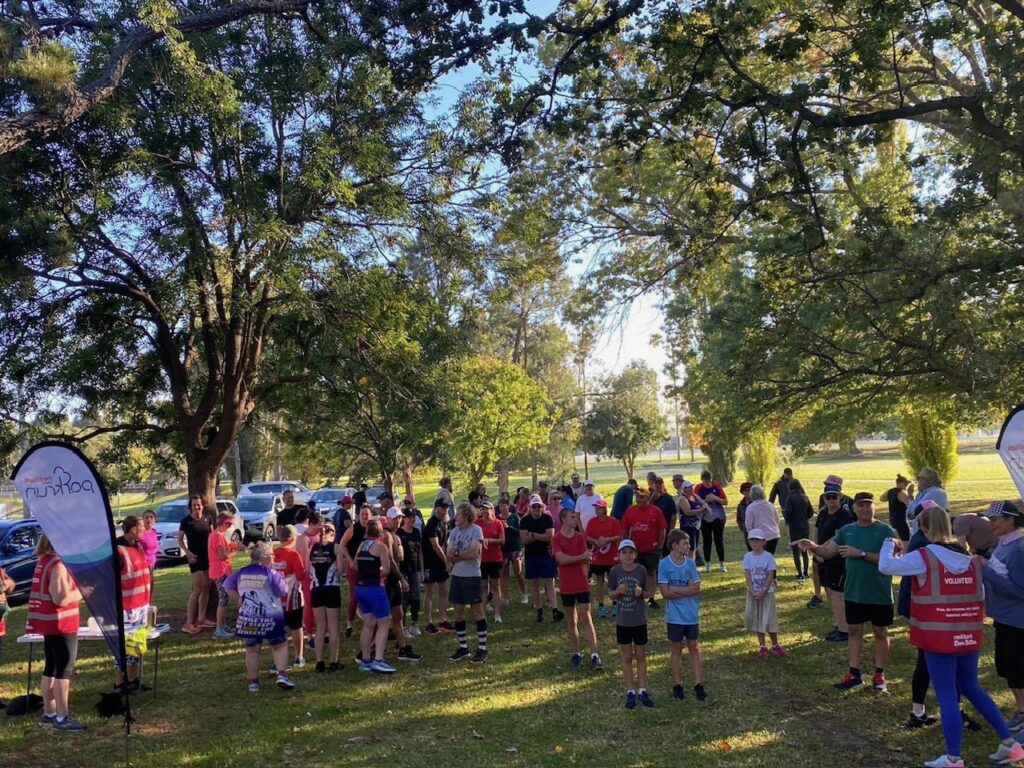 Runners gathering under the trees for Park Run Tenterfield