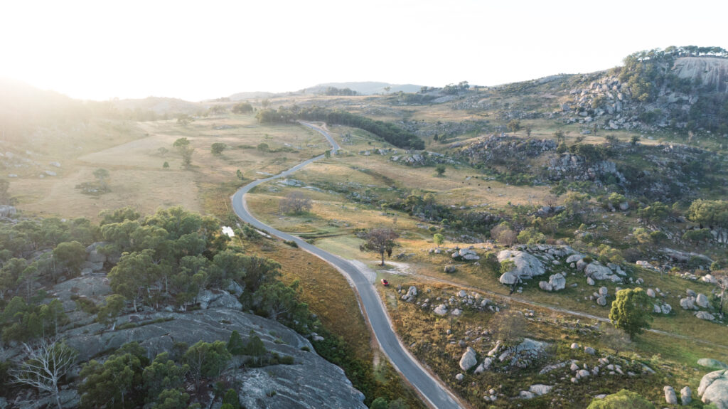Aerial view of Bald Rock's granite dome at sunset, photo by Sera J Wright