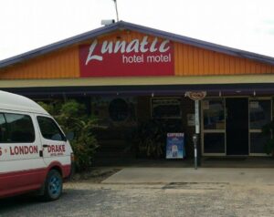 The Lunatic Hotel Motel at Drake with its orange roadside facade